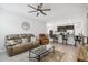 Inviting living room with tile flooring, ceiling fan, and comfortable seating arrangement at 1862 Overcup Ave, Saint Cloud, FL 34771