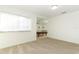 Bright bonus room featuring a window overlooking a pool table in the adjacent room at 14126 Fox Glove St, Winter Garden, FL 34787