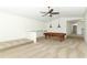 Open game room with high ceilings, a pool table, and a serving counter at 14126 Fox Glove St, Winter Garden, FL 34787