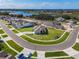 Aerial view of a single-Gathering home in a neighborhood near a lake at 16033 Barkly Ridge Ct, Winter Garden, FL 34787