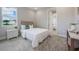 Cozy bedroom with soft carpet, a comfortable bed, and a bright window offering a peaceful setting at 16033 Barkly Ridge Ct, Winter Garden, FL 34787
