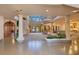Spacious foyer with high ceilings, grand columns, and abundant natural light from large windows at 6324 Deacon Cir, Windermere, FL 34786