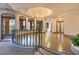 The living room has a decorative ceiling with arched windows and balcony at 6324 Deacon Cir, Windermere, FL 34786