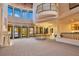 Bright living room features high ceilings, large windows, and a balcony at 6324 Deacon Cir, Windermere, FL 34786