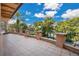 Expansive outdoor patio showcasing the manicured landscaping and stunning views of the water at 6324 Deacon Cir, Windermere, FL 34786