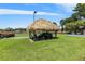 Community amenity featuring covered picnic area, adjacent to a sports court and open green space at 1965 Lake Markham Preserve Trl, Sanford, FL 32771