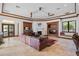 Spacious living room features a fireplace, custom built-ins, and a window seat at 1965 Lake Markham Preserve Trl, Sanford, FL 32771