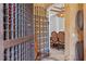 View of wine cellar looking into the dining room at 1965 Lake Markham Preserve Trl, Sanford, FL 32771