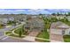 Aerial view of a two-story house in a residential neighborhood at 2003 American Beech Pkwy, Ocoee, FL 34761