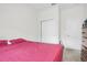 Bedroom with full-size bed and double door closet at 2003 American Beech Pkwy, Ocoee, FL 34761