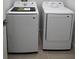 A conveniently located laundry area featuring a modern washer and dryer at 2560 Cavanaugh Dr, Orlando, FL 32817