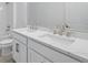 Elegant bathroom with double sinks, marble countertops, and modern fixtures at 2585 Cavanaugh Dr, Orlando, FL 32817