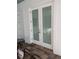 White French doors with frosted glass panels leading outdoors at 816 Johns Point Dr, Oakland, FL 34787