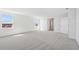 Spacious main bedroom featuring ample natural light, carpet flooring and an ensuite bathroom at 1694 Pinecliff Dr, Apopka, FL 32703