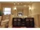 Stylish bathroom featuring double vanity with modern sinks and fixtures, plus updated lighting and toilet at 1010 Strathmore Dr, Orlando, FL 32806