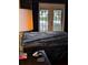 Bedroom view of the lake from the french doors leading to the outside at 1010 Strathmore Dr, Orlando, FL 32806