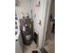 View of the hot water heater in the laundry room at 1010 Strathmore Dr, Orlando, FL 32806