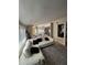 Bright living room featuring neutral décor, a plush sofa, and stylish accents at 1010 Strathmore Dr, Orlando, FL 32806