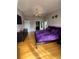 Spacious main bedroom with hardwood floors, walk-in closet, and ensuite bathroom at 1010 Strathmore Dr, Orlando, FL 32806