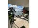 Charming patio with lake view and comfortable lounge chairs, perfect for relaxation at 1010 Strathmore Dr, Orlando, FL 32806