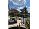 Beautiful backyard patio with lounge furniture, umbrella, and view of the landscaping and pool at 1010 Strathmore Dr, Orlando, FL 32806