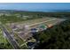 Aerial view showing new homes under construction near waterfront at 1181 Basalt Ln, Sanford, FL 32771