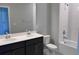 Bathroom with a double sink vanity, a large mirror, and a shower-tub combo at 1181 Basalt Ln, Sanford, FL 32771