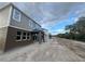 Two-story home with neutral siding and a covered porch at 1181 Basalt Ln, Sanford, FL 32771