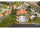 Aerial view of community including pool and homes at 886 Grazie Loop, Davenport, FL 33837