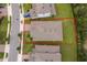 Aerial view of the property, showcasing the house, lot, and surrounding neighborhood in a desirable location at 886 Grazie Loop, Davenport, FL 33837