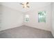 Spacious bedroom with neutral walls and carpeting at 886 Grazie Loop, Davenport, FL 33837