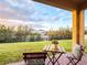 Relaxing patio with seating area and backyard view at 886 Grazie Loop, Davenport, FL 33837