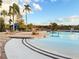 Resort-style community pool with lake views at 886 Grazie Loop, Davenport, FL 33837