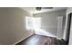 Spacious bedroom with hardwood floors and window at 3408 Lewis Ct, Orlando, FL 32805