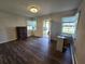 Spacious bedroom with ample natural light and wood floors at 3408 Lewis Ct, Orlando, FL 32805