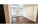 Bright dining area with hardwood floors and natural light at 3408 Lewis Ct, Orlando, FL 32805