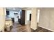 Renovated kitchen featuring dark cabinetry and new flooring at 3408 Lewis Ct, Orlando, FL 32805