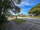 Street view showcasing a quiet, tree-lined neighborhood at 3408 Lewis Ct, Orlando, FL 32805