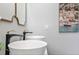Modern bathroom boasts dual vessel sinks, elegant fixtures, and stylish decor at 10544 Wyndcliff Dr, Orlando, FL 32817