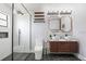 Sleek bathroom showcasing an open glass shower, dual sinks, and modern fixtures at 10544 Wyndcliff Dr, Orlando, FL 32817