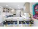 Contemporary kitchen featuring stainless steel appliances, bar seating, and stylish decor at 10544 Wyndcliff Dr, Orlando, FL 32817