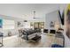 Spacious living room featuring contemporary decor, vaulted ceilings, and sliding glass doors at 10544 Wyndcliff Dr, Orlando, FL 32817