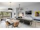 Inviting open-concept living area with a dining table and access to an outdoor patio at 10544 Wyndcliff Dr, Orlando, FL 32817