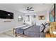 Comfortable main bedroom featuring a TV, walk in closet, and calming decorations at 10544 Wyndcliff Dr, Orlando, FL 32817