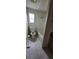 Bathroom features a toilet and shower at 2661 Waccassa St, Geneva, FL 32732