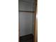 Bedroom closet with wood shelving and hanging rod at 2661 Waccassa St, Geneva, FL 32732