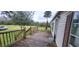 Wooden deck overlooks grassy yard at 2661 Waccassa St, Geneva, FL 32732