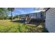 Quaint home with a cozy front deck and a well-maintained lawn, perfect for enjoying the outdoors at 2661 Waccassa St, Geneva, FL 32732