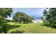 Mobile home with large yard and mature trees at 2661 Waccassa St, Geneva, FL 32732