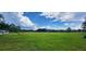 Spacious land with lush grass and mature trees at 2661 Waccassa St, Geneva, FL 32732
